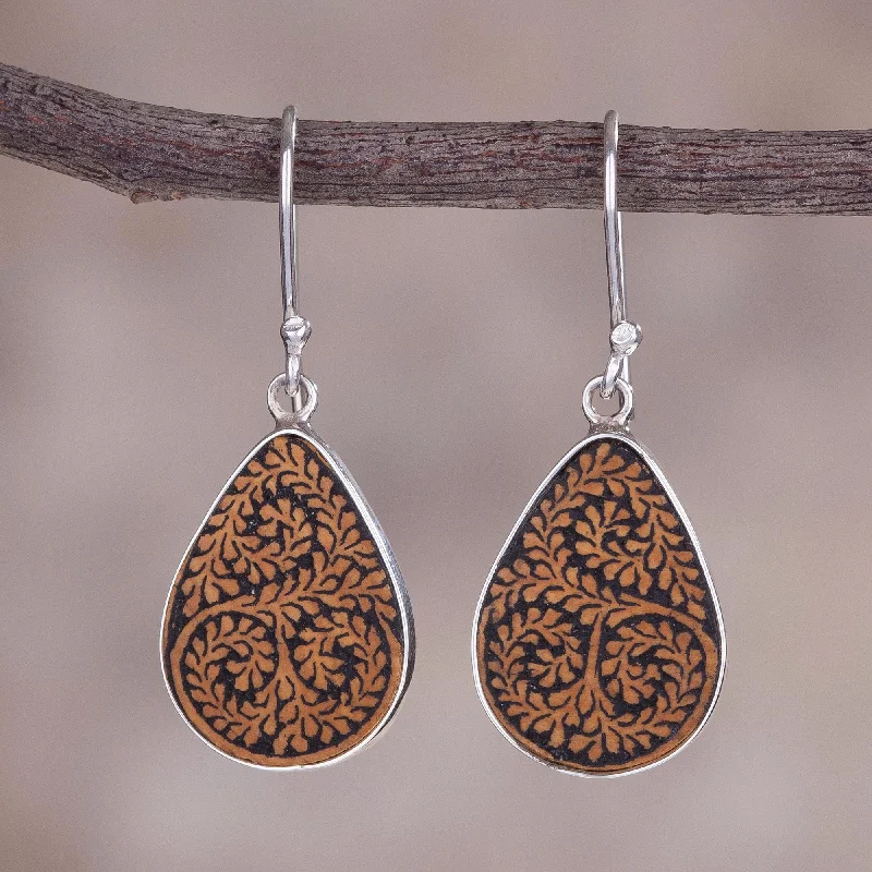 Shop Handcrafted Jewelry At Special Promotional Rates Enchanted Copse Leafy Sterling Silver and Pumpkin Shell Earrings from Peru