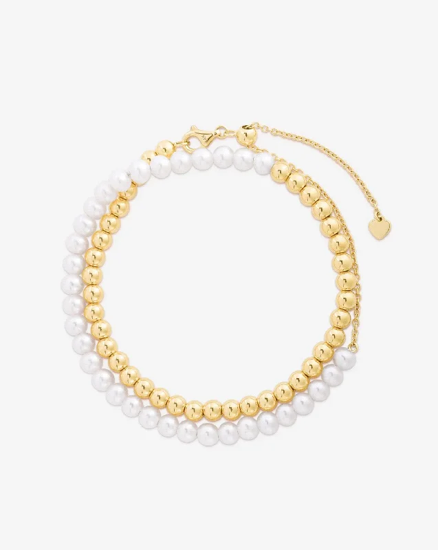 The Perfect Jewelry Piece At The Perfect Discount Multiway Pearl and Gold Beaded Necklace + Double Wrap Bracelet The Perfect Jewelry Piece At The Perfect Discount Multiway Pearl and Gold Beaded Necklace + Double Wrap Bracelet