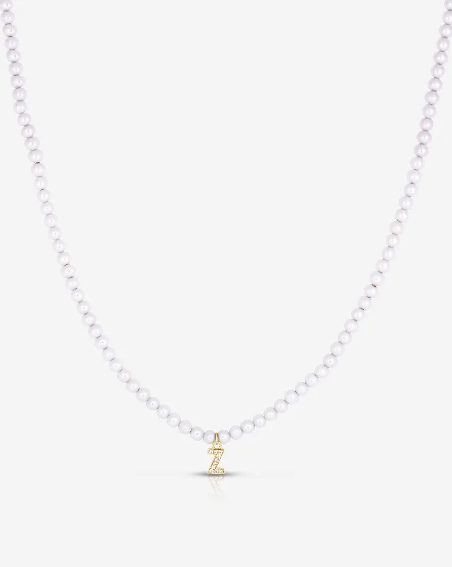 Last Chance To Shop High-End Jewelry At Markdown Prices Pearl + Pavé Initial Choker