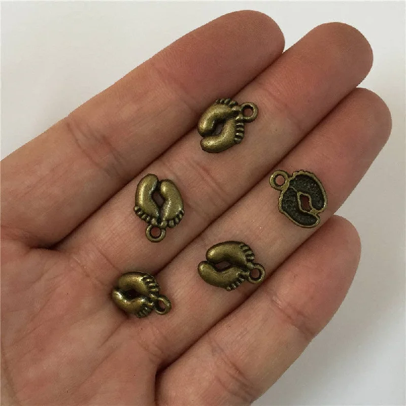 Don't Miss Out On Jaw-Dropping Jewelry Discounts 30units antique brass small Footprints, footprints pendant charms jewelry finding suppliers D-3-140